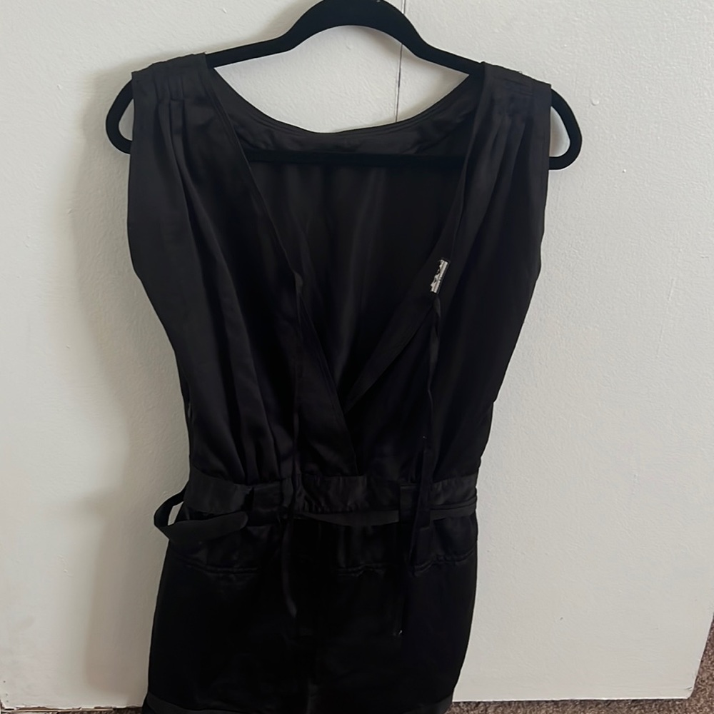 A black silk romper.